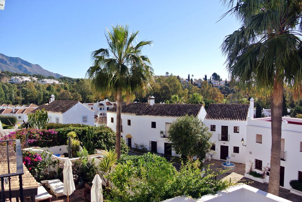 View over mountains and ocean from balcony