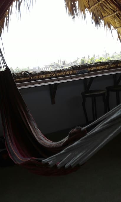 Hammock upstairs with a view to the ocean.