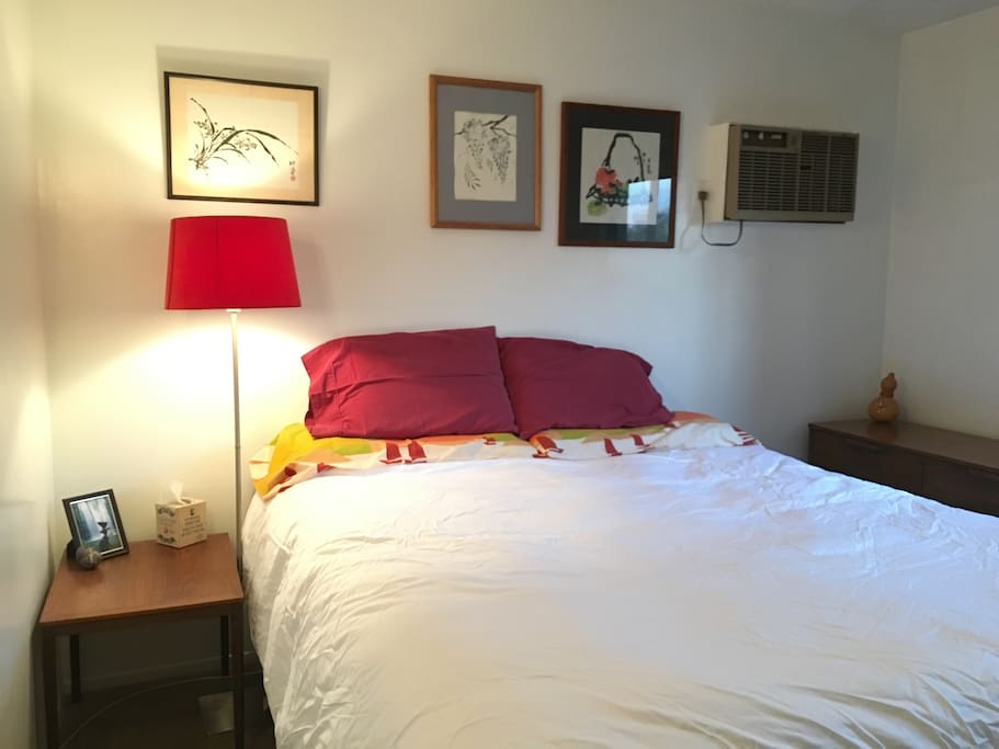 Kingsize bed with down comforter for winter.