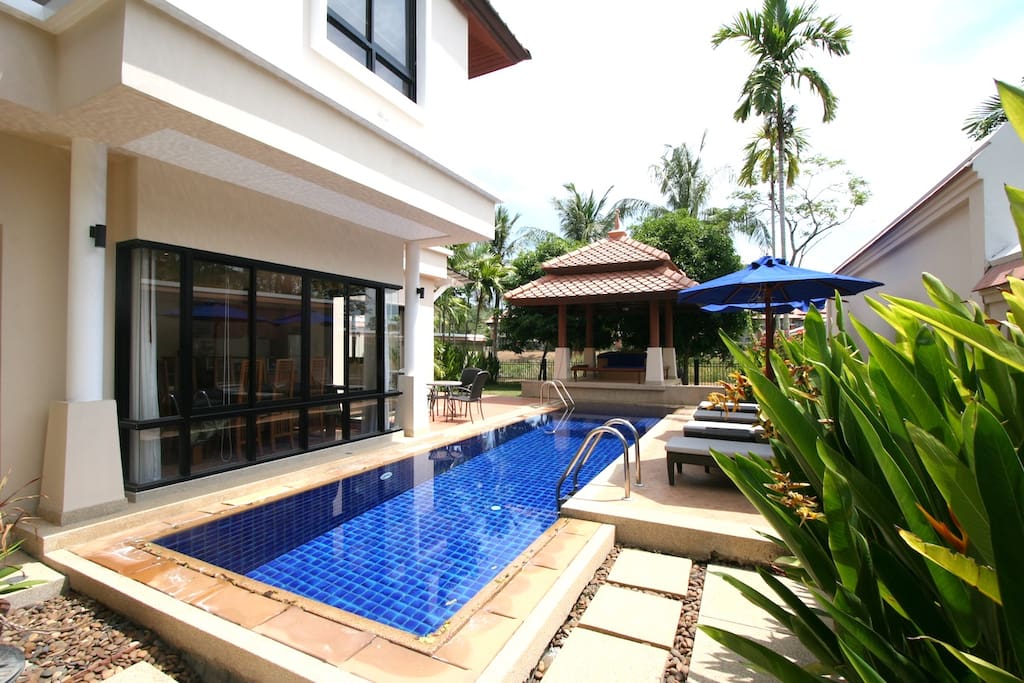 External area with sunbeds and private pool