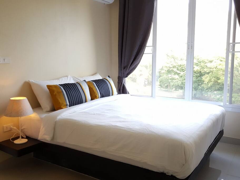 Queen size bedroom with air condition. Nice mountain view from the bedroom.
