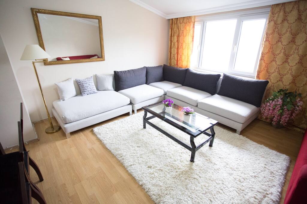 Living room with big screen satalite LCD TV and air condition