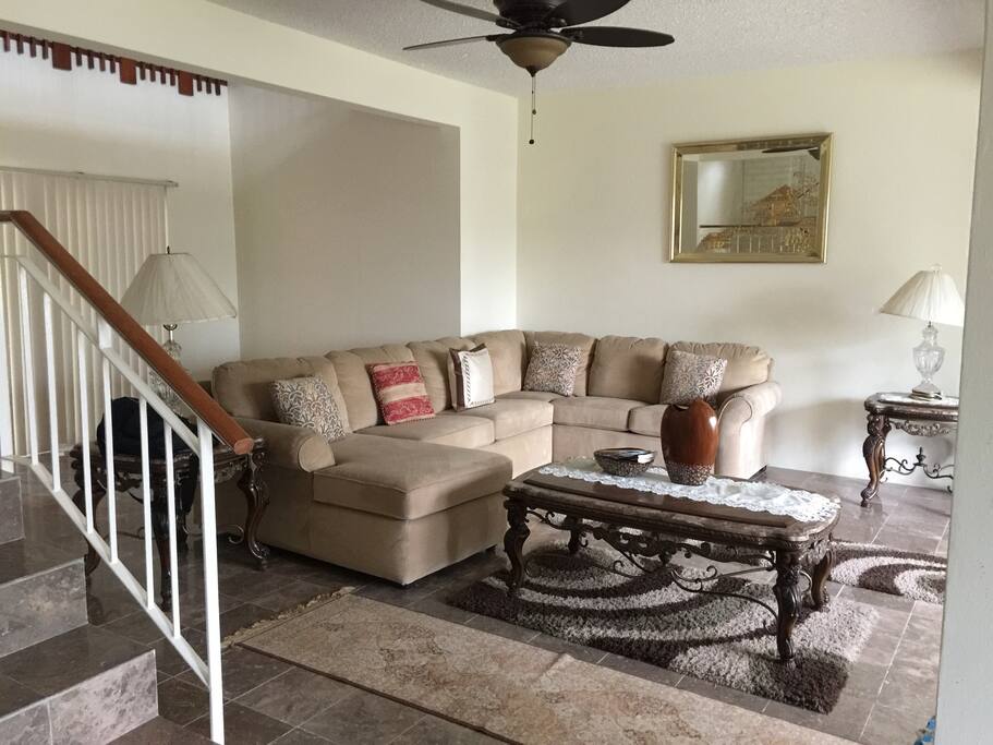 Downstairs common area with tv