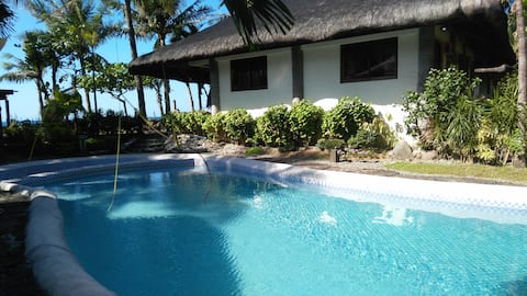 Beachfront house in Baua with swimming pool.