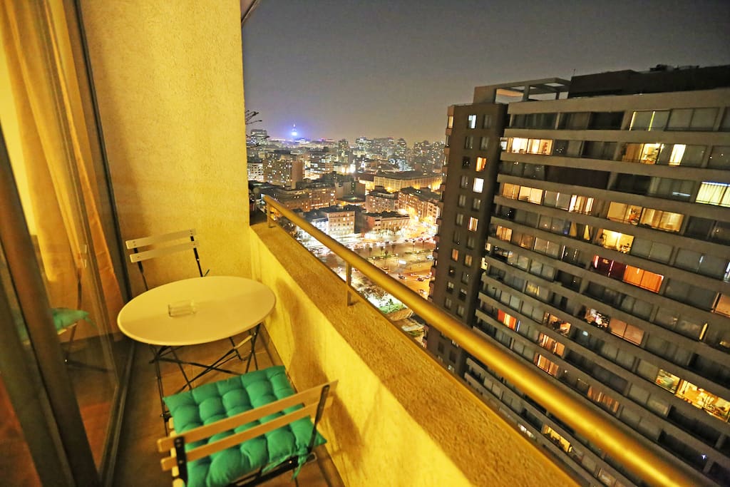 Apartment balcony (26th floor), view Santiago Center, Entel Tower, Forestal Park and Mapocho River