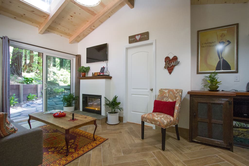 This is your first view when you enter with push button fireplace, tv with dvd, and heated floors.