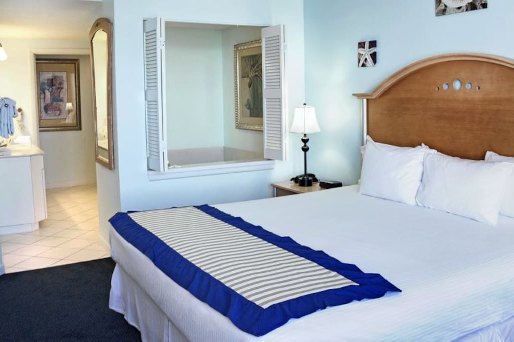 Master Bedroom with King Size Bed. Please Note that layouts and decor vary.
