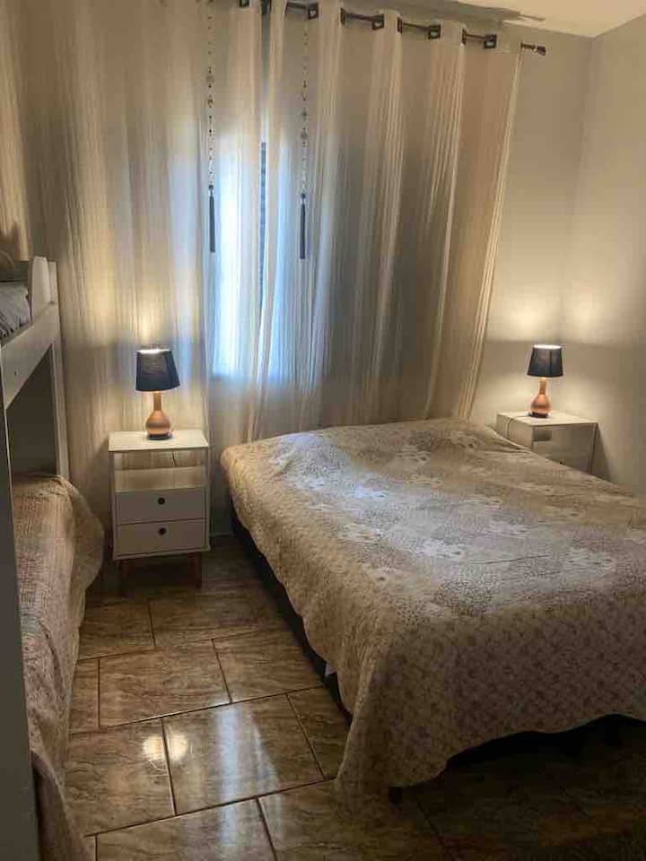 Bedroom 1 - suite with 1 double bed box and 2 single beds 