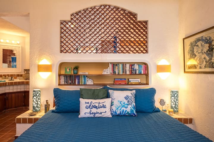 Enjoy a book while lounging in bed or just relax and gaze at the ocean....