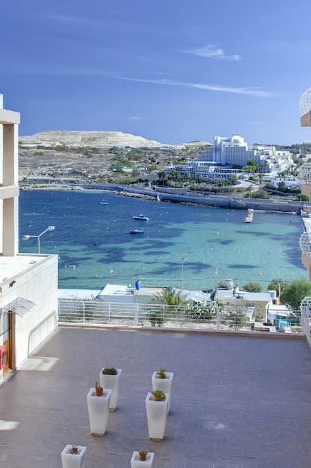 View from balcony with terrace above road level