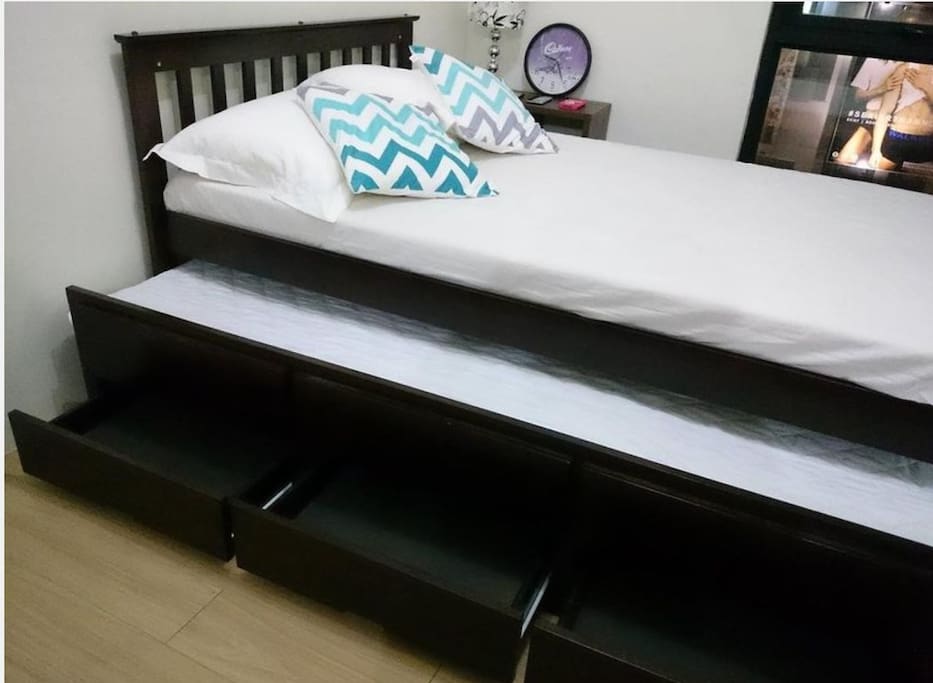 Transformer bed into 2 double bed with draws
