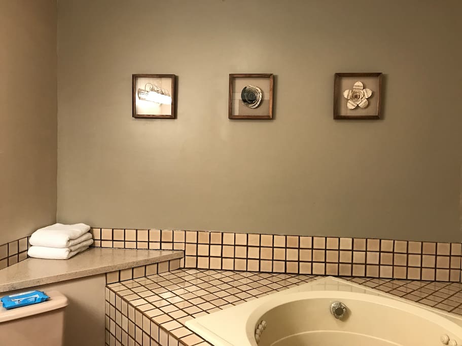 Upstairs bathroom with Whirlpool tub and shower