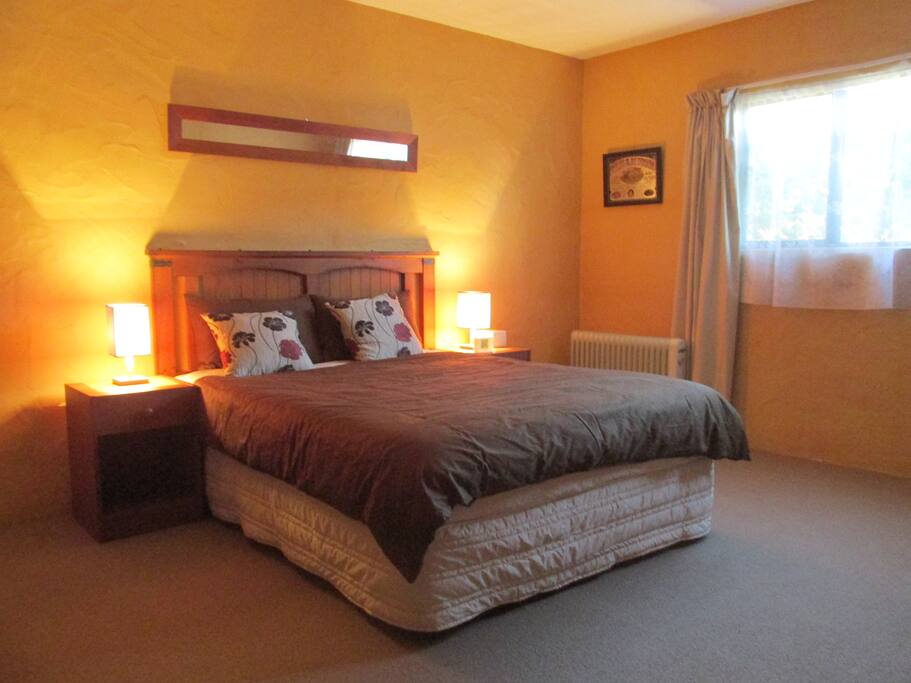 The bedroom - Comfortable queen sized bed.