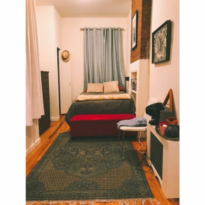 Queen bed with plenty of storage for clothes, shoes, etc.
