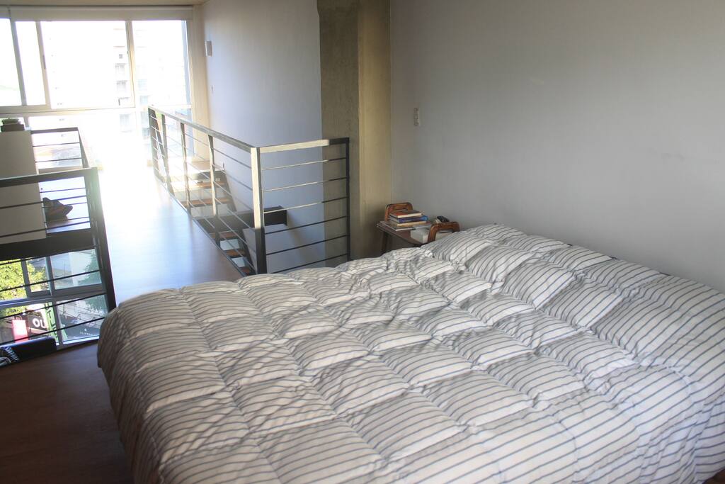 Bedroom with queen size bed.