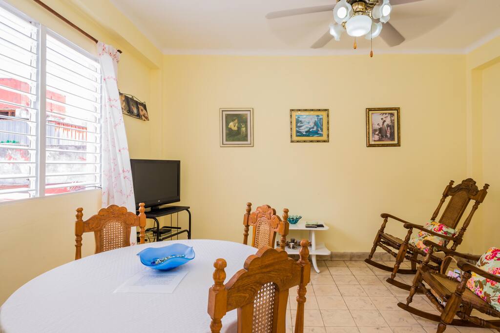Enjoy your morning café in this brightly lit room which connects to the outdoor patio.