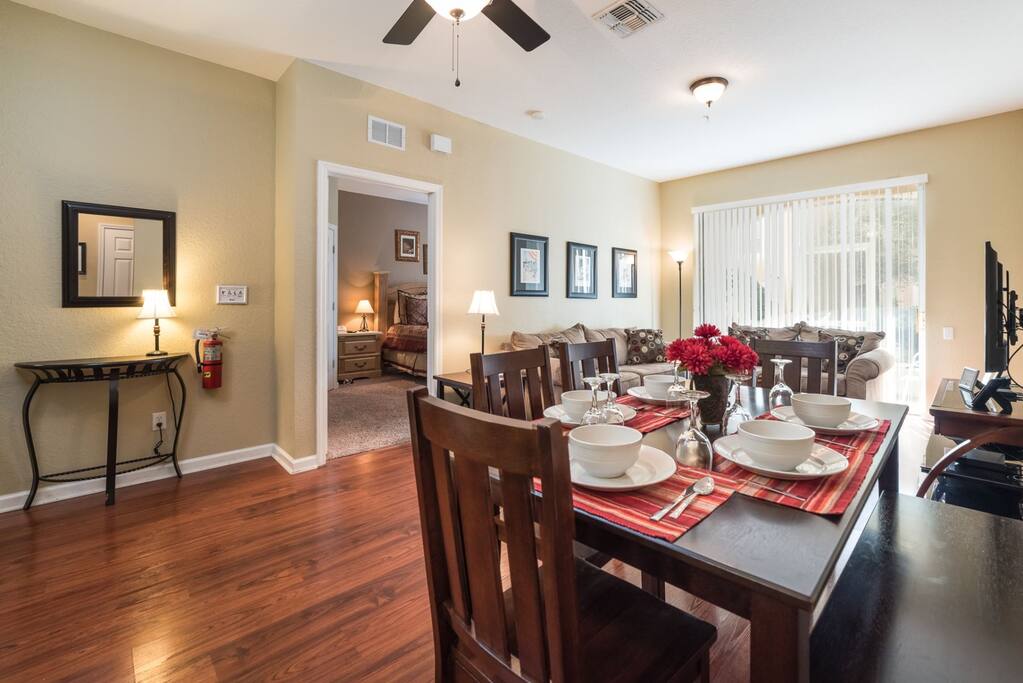 Dining room complete with upgraded ceiling fan and seating for six
