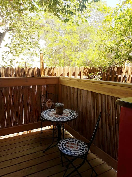 Seating area on your own deck, great place to relax and listen to the birds.