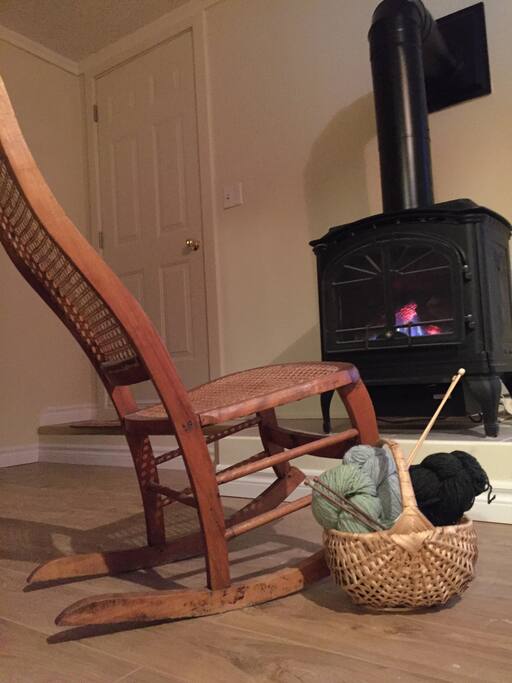 Enjoy a winter's night by the gas, cast iron stove.