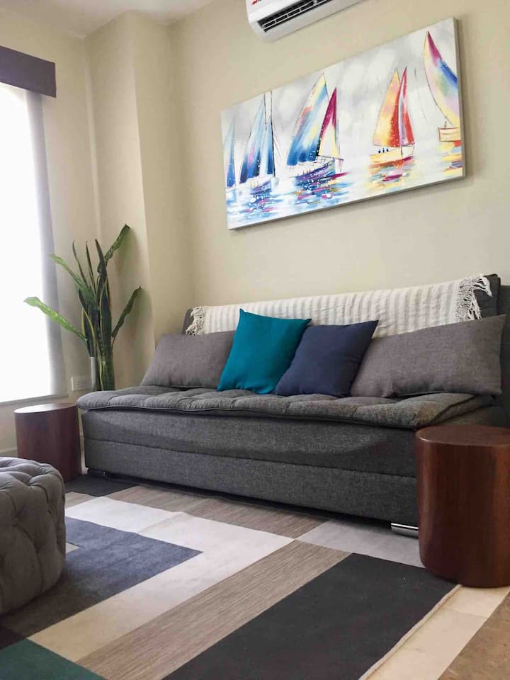 Sala de TV con sofá cama