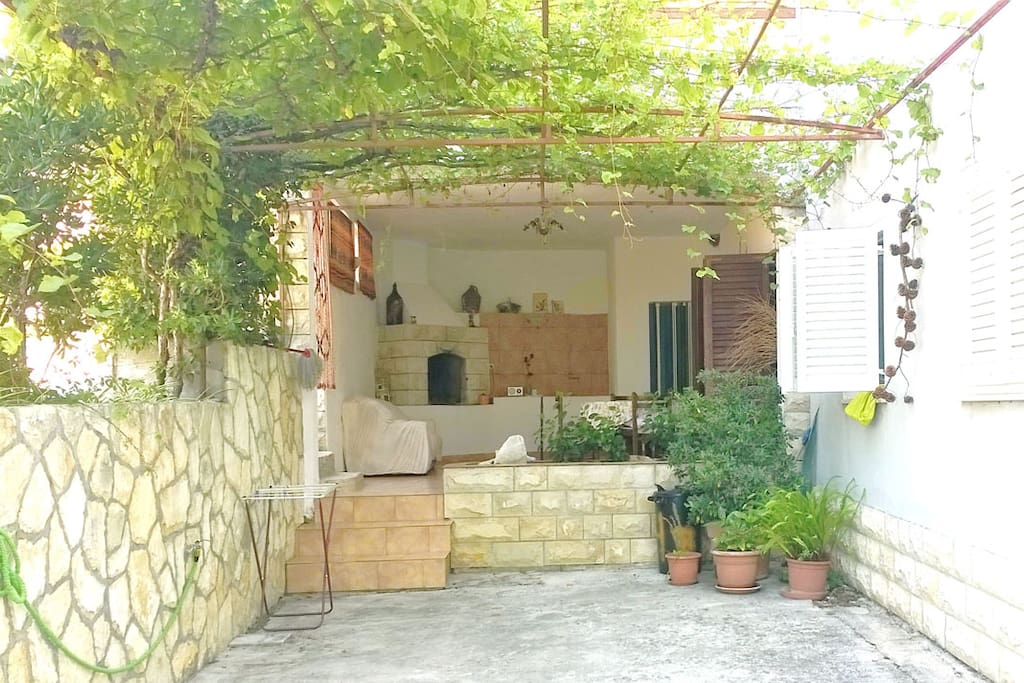 backyard with "grill kitchen"