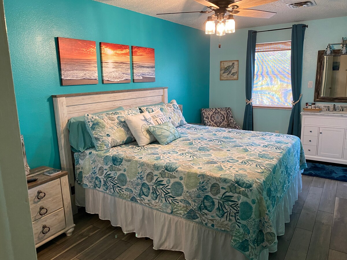 Master Bedroom in Unit #1 with KING size Bed, en suite bathroom, black out curtains and smart TV