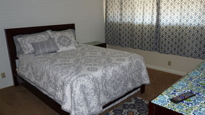 Second Master bedroom with large screen TV