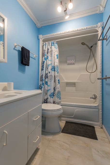 Upstairs Bathroom with Shower Gel, Shampoo, and Conditioner