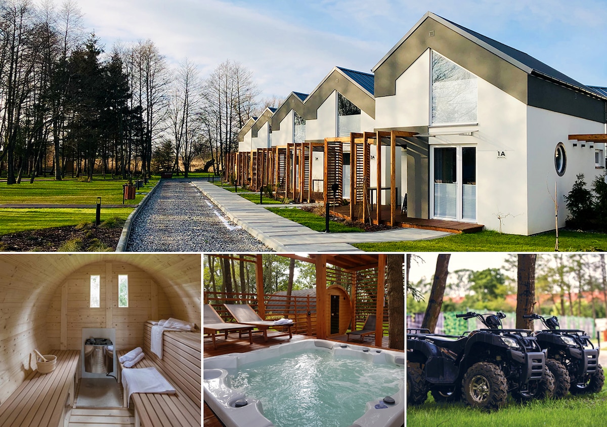 The exterior of modern lodges is shown, featuring large windows and wooden accents. A pathway lined with gravel leads to the entrance. In the collage, a wooden sauna interior, a hot tub surrounded by nature, and all-terrain vehicles are visible, highlighting available leisure options.