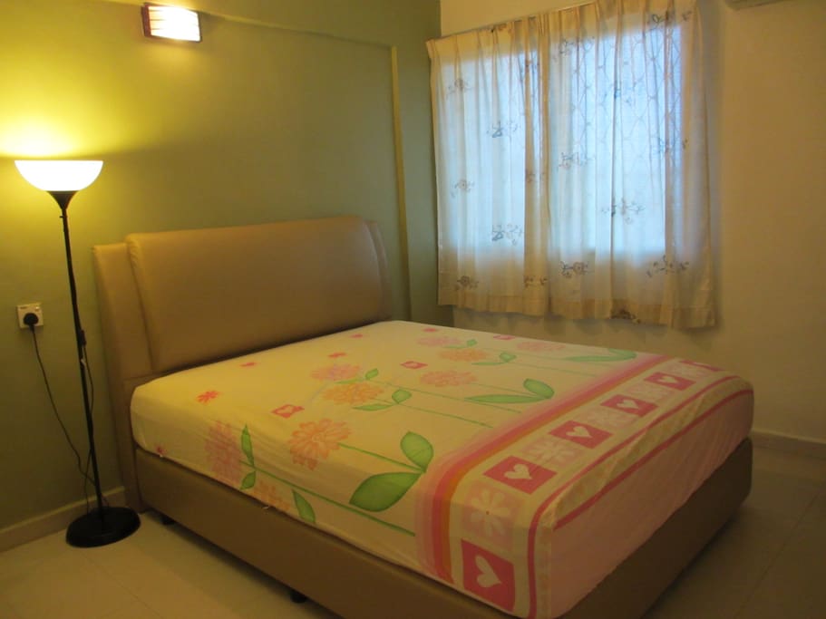 One bedroom comes with a Queen Size Bed and an air conditioning.
