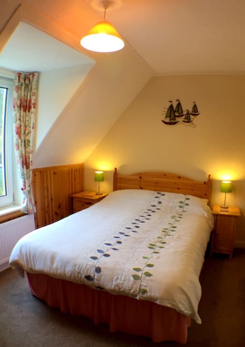 Double en-suite room with garden view.