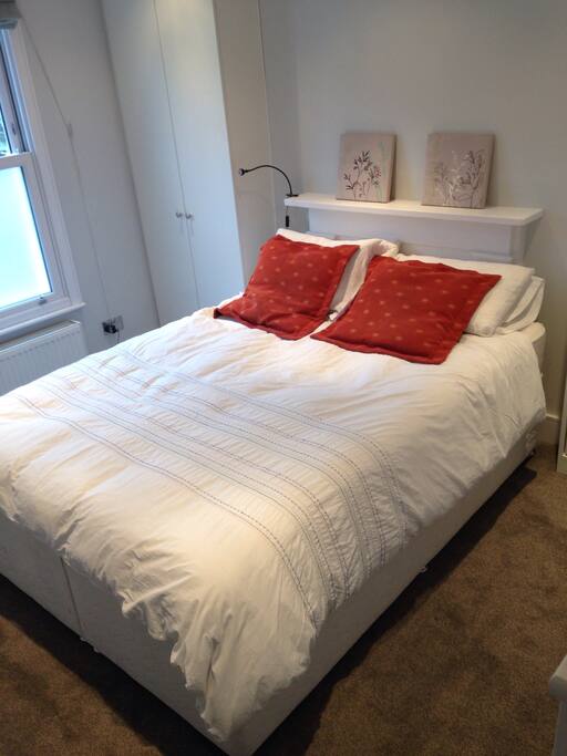 Large bedroom, kind size bed with built in wardrobes
