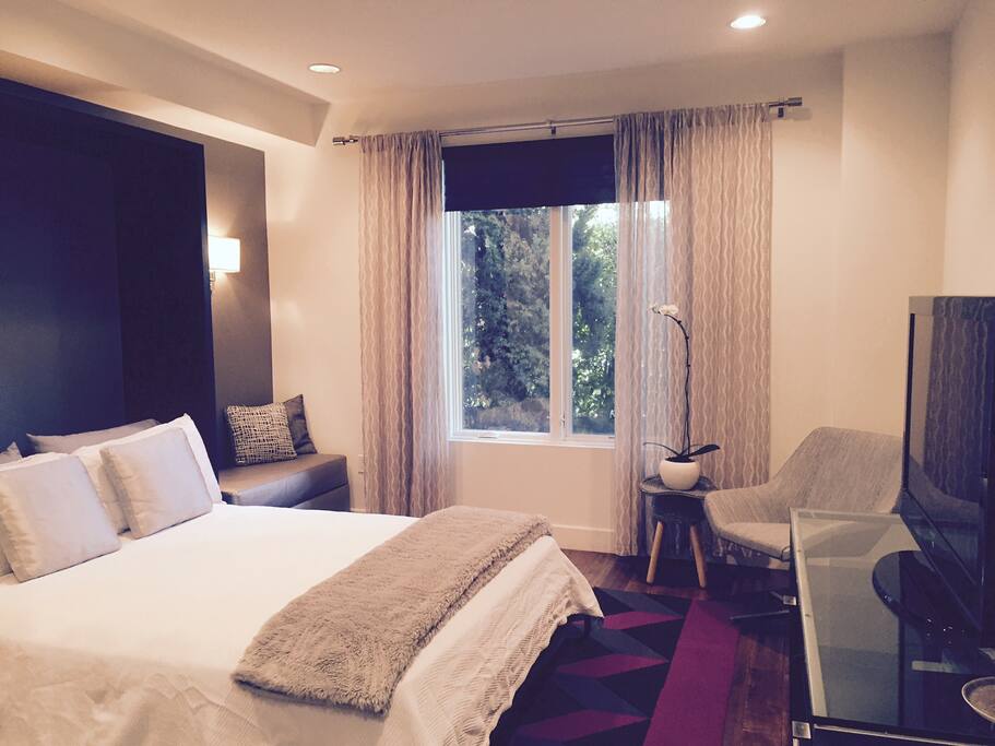 Second Master Suite with Queen Bed, 42" Screen.