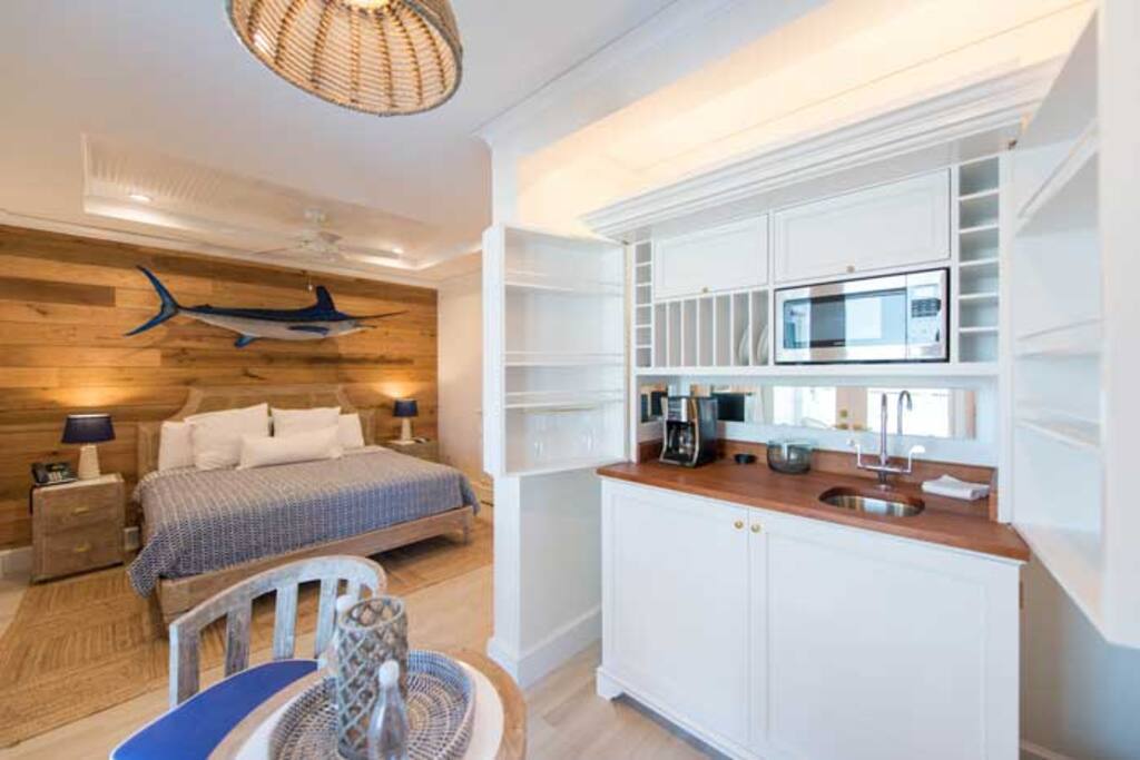 Enjoy your morning coffee on the balcony with a panoramic view of Sunset Beach.