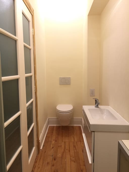 Newly renovated ensuite private three piece ensuite bathroom with wall mounted toto toilet.