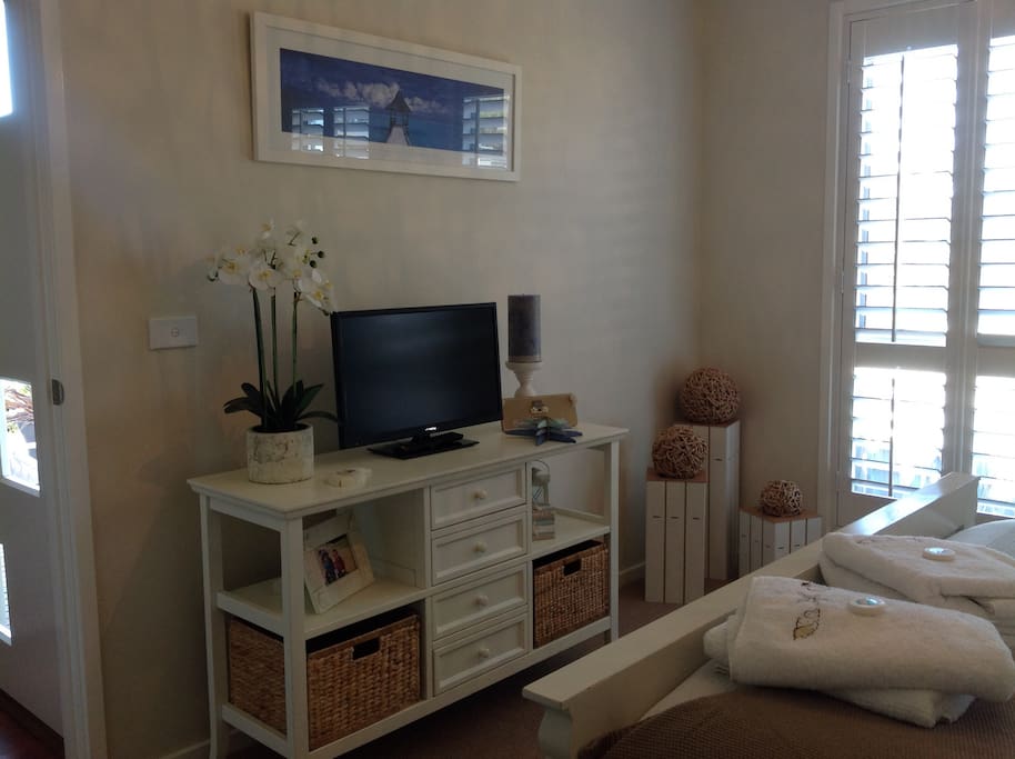 Additional TV and DVD player in main bedroom.