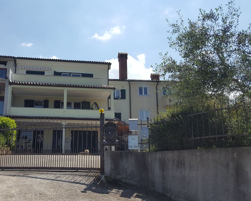 A house where the apartment is. The apartment is in 2nd floor (unfortunally without elevator - 30 steps). You can park in front of the house your bicycles, too. It is very safe location.