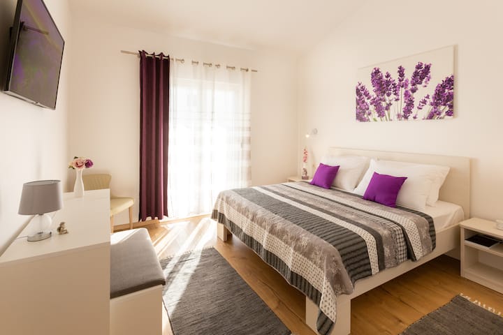 Fourth double bedroom is on the first floor, is oriented south and has an access to a big balcony of 23 sqm