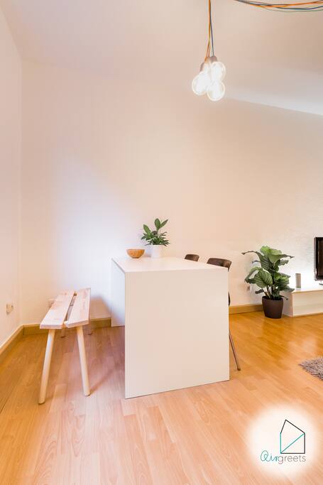 The dining table offers a beautiful place to enjoy delicious meals.