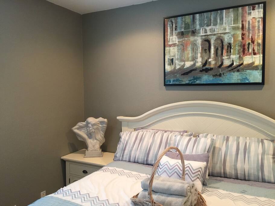 Executive style, Large Cal King bed. Adjustable lights.