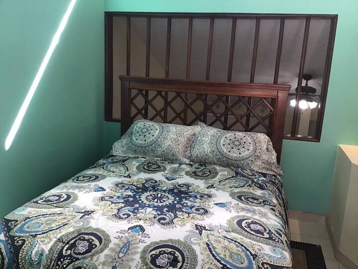 Upstairs bedroom queen size mattress. Air conditioning 