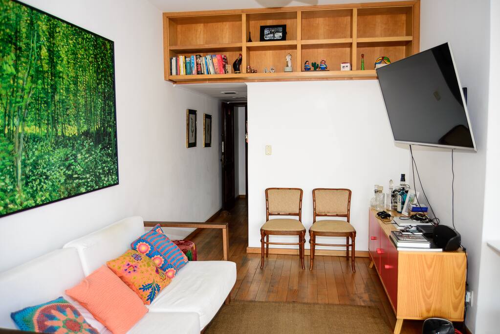 Comfortable couch and a tv with cable and video game