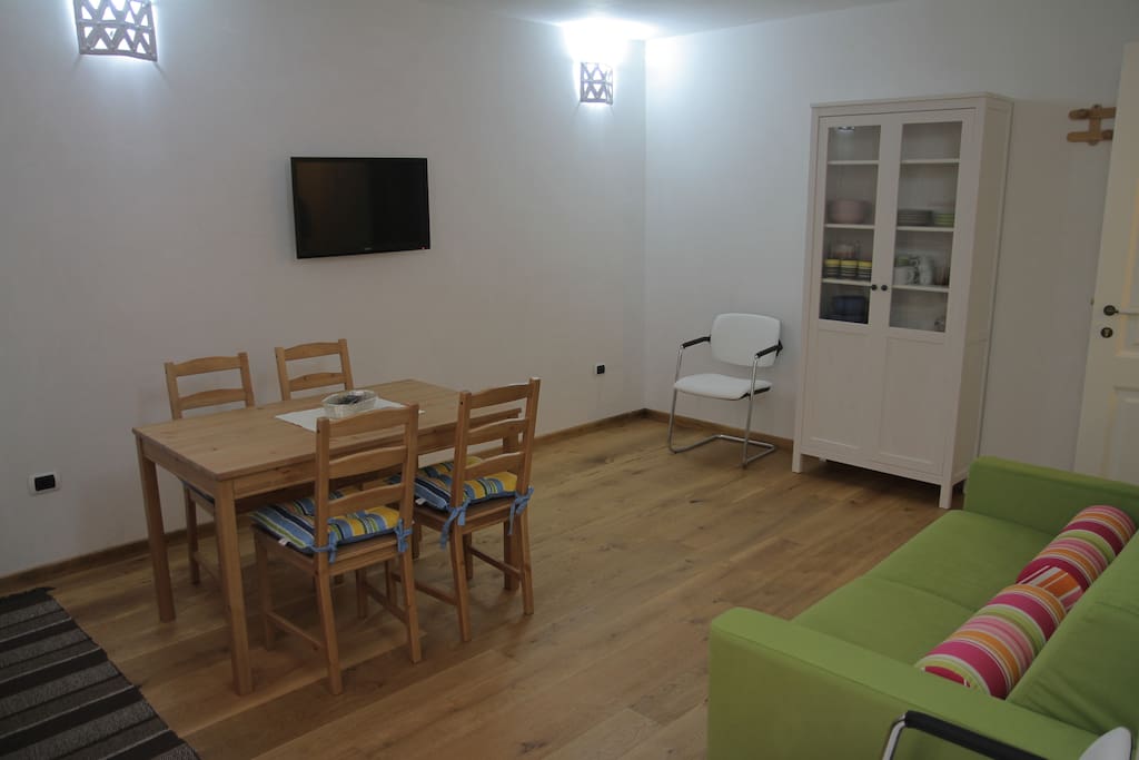 Living room, dining table and kitchen