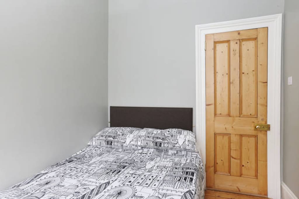 Double room with garden view. The bed is a UK standard double size 4ft6in wide