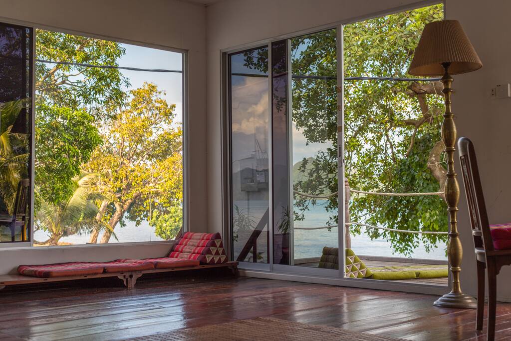 Lounge area with all the doors/windows open for the view and some sun