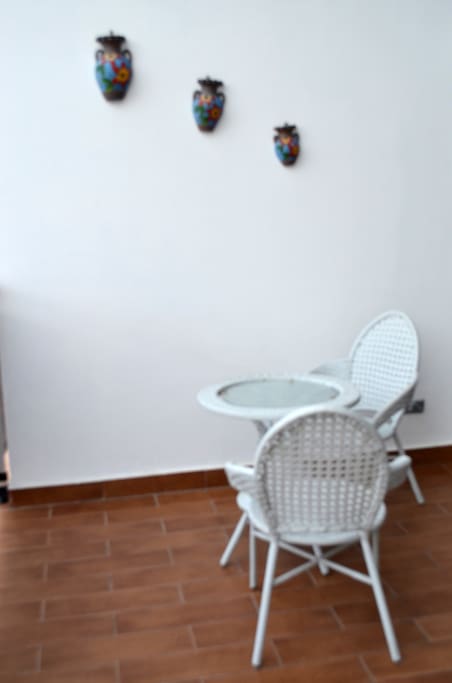 small table to chairs for balcony