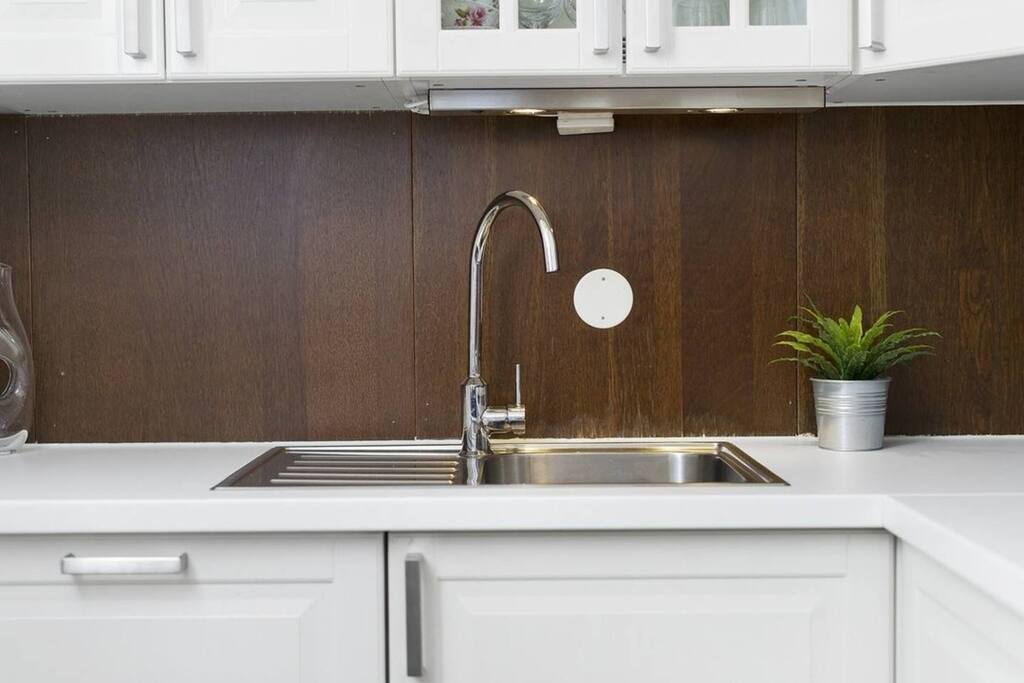Fully equipped kitchen with Nespresso machine, dish-washer, fridge, freezer, oven and cooker
