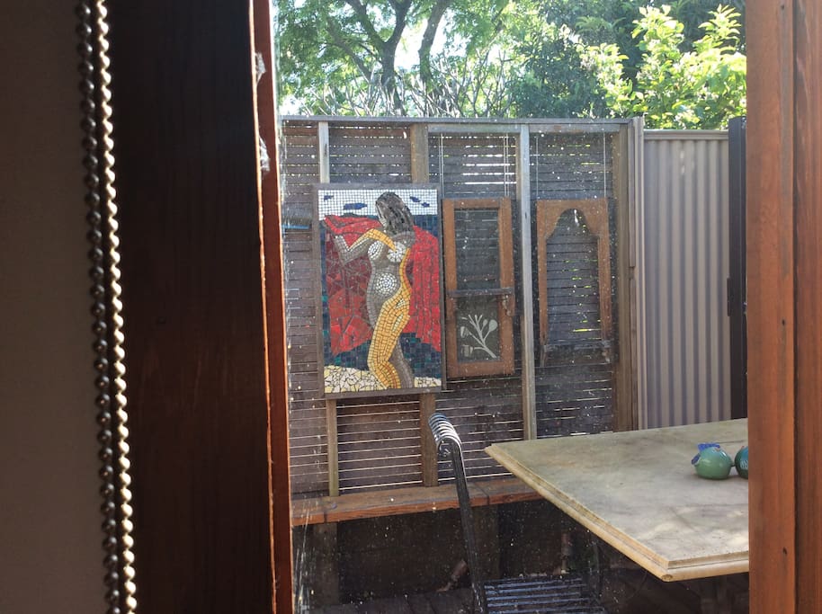 Back patio looking through kitchen french doors
