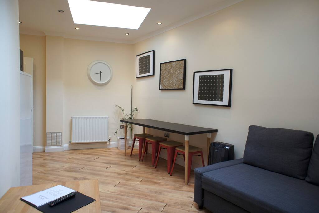 Here's your living room with double sofa bed