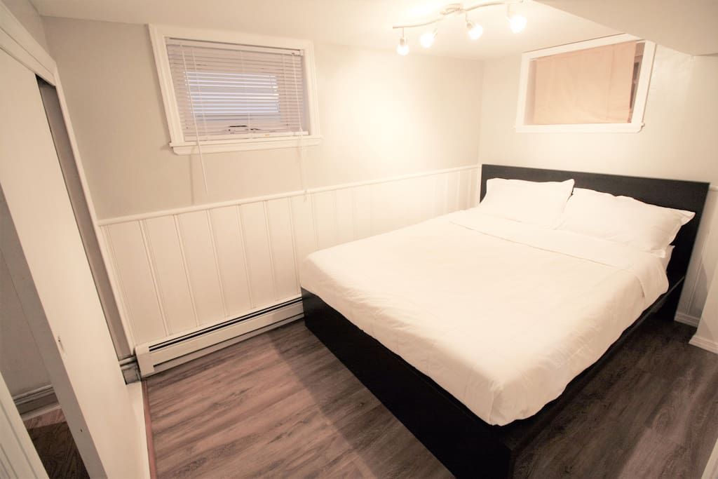 Private bedroom with door lock, closet for hanging clothes.